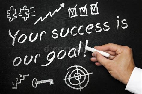 Your Success Is Our Goal Blackboard Or Chalkboard With Hand And Chalk