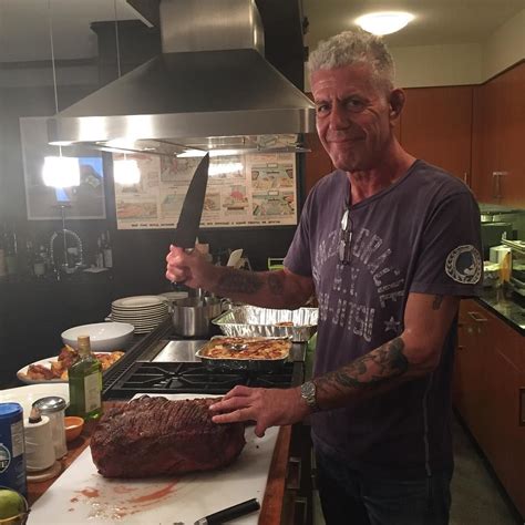 Anthony Bourdain Gets Ready To Carve Some Meat Anthony Bourdain