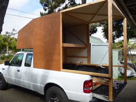 Building out the interior walls of the truck camper the roof has one hard end that hinges down and two soft sides made of duck canvas. How to Build a Lightweight Truck Camper: A Start-to-Finish Guide