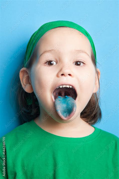 Little Girl With Blue Tongue Stock Photo Adobe Stock