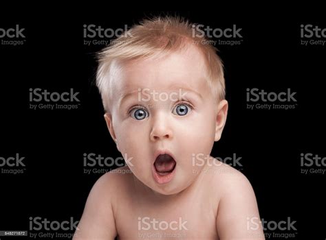Newborn Baby Portrait With Funny Shocked Face Expression