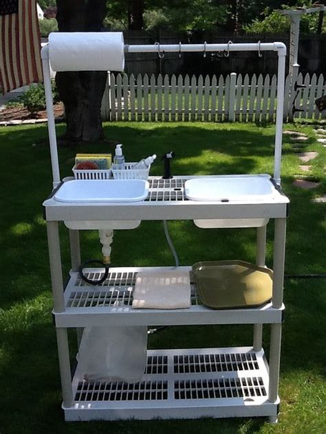 You must determine the overall design, materials used, possible internal electrical and plumbing systems, roofing and siding choices, and internal. DIY Camp Kitchen w/Working Sink Tutorial : made from a stacking storage shelf unit + PVC pipe ...