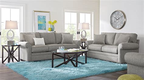 Gray is one of the most popular colors because it works so well with other colors—even black and white. Blue, Slate & White Living Room Furniture & Decorating Ideas