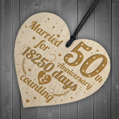 A perfect gift may be our 10th (tin) anniversary wedding day chart. 50th Wedding Anniversary Wood Heart Gift Gold Fifty Years ...