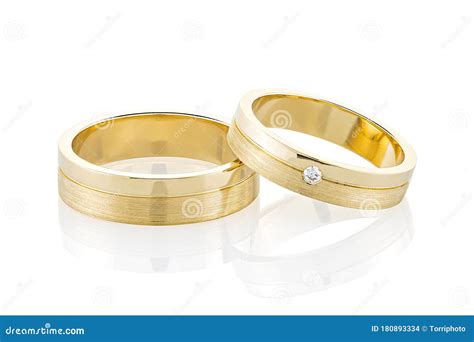 Pair Of Gold Wedding Rings Isolated On White Background Stock Photo