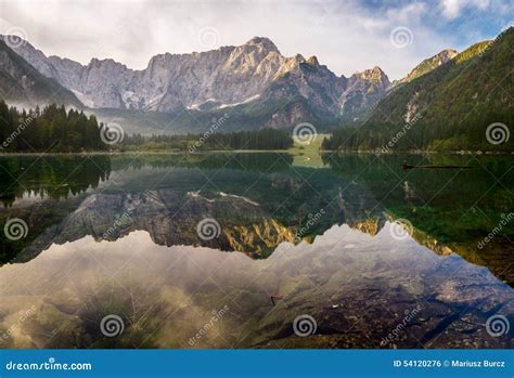 Beautiful Sunrise Over The Mountain Lake In The Julian Alps Stock Photo