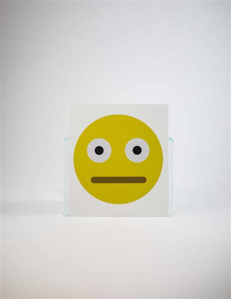 The emoji shows a face with straight lined eyes and mouth. Straight Face Emoji Decal | Wallflower Market