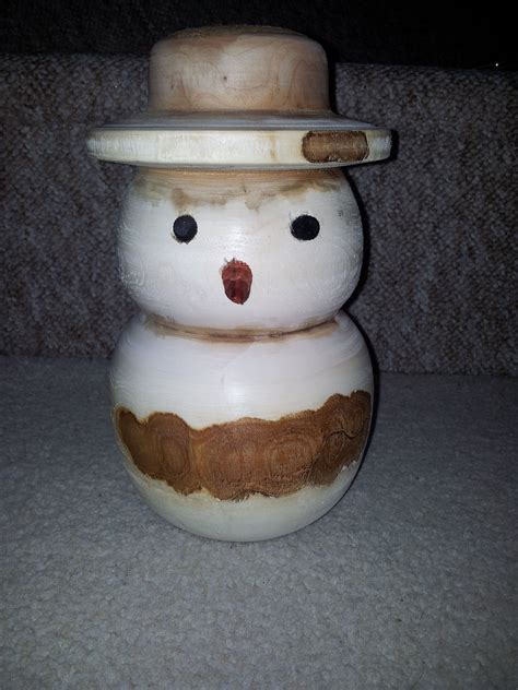 Turned Wooden Snowman Made From Smaller Pieces Of Wood Wood