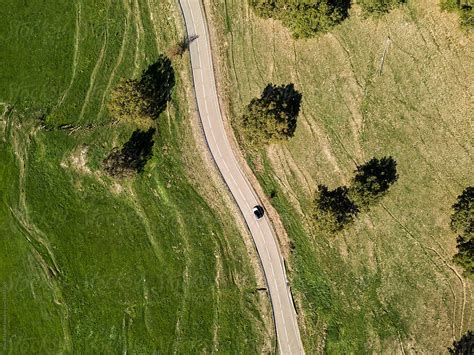 Birds Eye View Of A Road With A Car By Stocksy Contributor Bisual