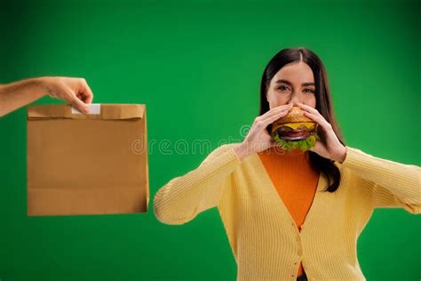 hungry woman eating delicious burger near stock image image of cheeseburger caucasian 267507851