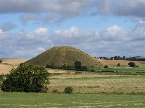 I designed a low, curving mound of earth about half a metre high to contain the garden. Silbury Hill the largest earth mound in Europe. Avebury ...