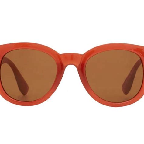 tinted sunglasses and coloured shades trend rose orange green tinted glamour uk