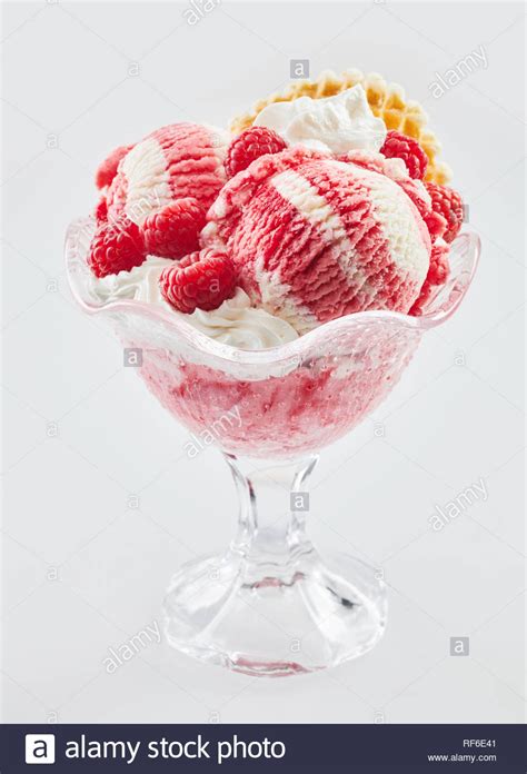 Download This Stock Image Delicious Vanilla And Raspberry Ice Cream Dessert In A Glass Cup