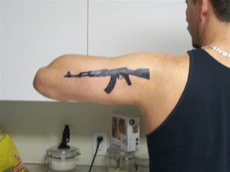 Ak 47 Gun Tattoo On Back Of Arm Tattoos Book 65000 Tattoos Designs