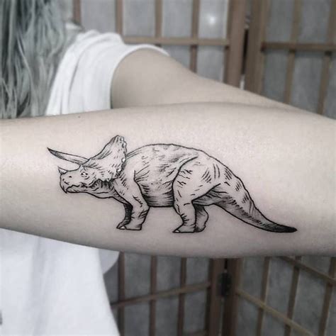 33 Best Dinosaur Tattoo Designs And Ideas Tattoobloq Dinosaur Tattoos Tattoos Tattoo Designs
