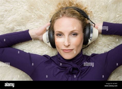 A Woman Wearing Old Fashioned Headphones Stock Photo Alamy