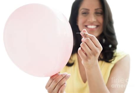 Woman Popping A Balloon Photograph By Science Photo Library Pixels
