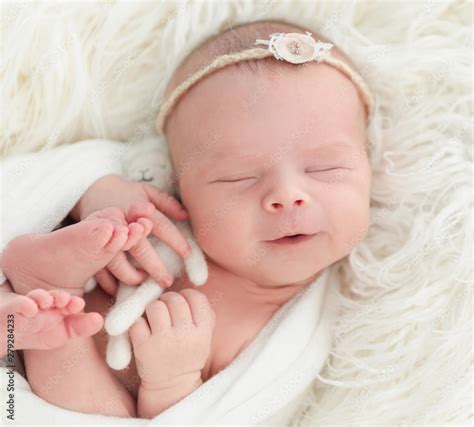 Newborn Baby Sleeping With A Small Toy Stock Foto Adobe Stock