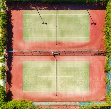 Aerial View Of Tennis Court At Sunset In Summer Top View Stock Photo