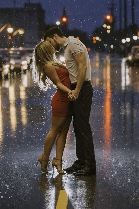Cute Couple Kissing In The Rain