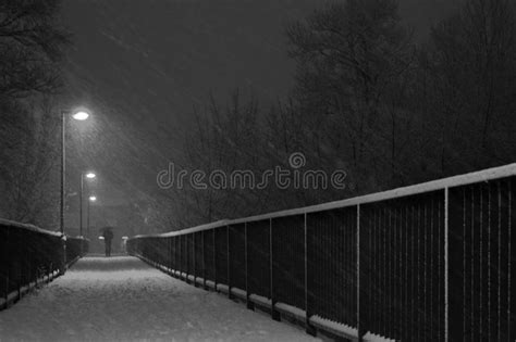 Man On A Pedestrian Bridge In The Snow Stock Photo Image Of Winter