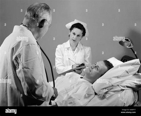 1950s Doctor Nurse Patient Bed Hospital Sick Illness Stock Photo Alamy