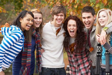 Group Of Six Teenage Friends Having Fun Stock Photo Image Of Blue