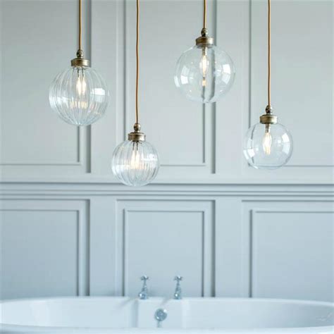 These gorgeous modern lighting solutions are perfect for anyone who enjoys luxury decor. Bathroom Pendant Lights - Mad About The House