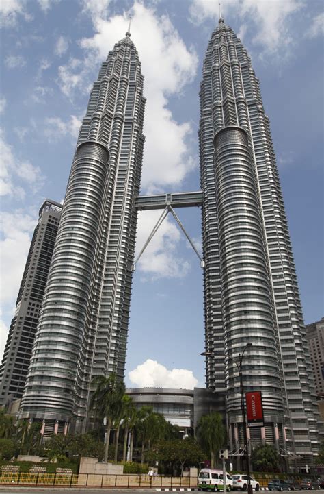 Its roof height is 417 meters which just same as the north tower of the original world trade center, but the spire is made longer, bringing its total height to 546 meters and 541 meters (1776 ft) by architectural height. Petronas Twin Towers Time to Witness Some Architectural ...