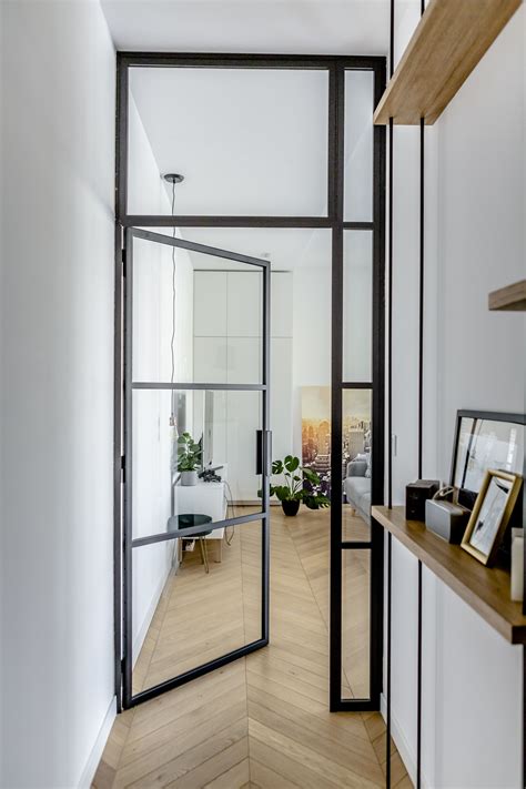 On many occasions the garage acts as entry points to our house, providing our guests with a first impression of our home. metal glass doors interior design black | Door design ...