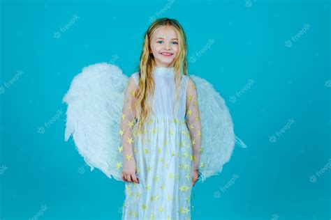 Premium Photo Lovely And Cute Little Girl Angel Little Angel Girl In