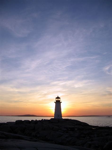 Peggys Cove Lighthouse At Sunset Sunset Lighthouse Cove
