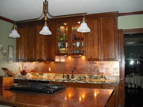 This kitchen got a beautiful redesign featuring our 5 mil (36 gauge) azul copper and our raw 10 mil (30 gauge) copper with an antique patina. Copper backsplash for a distinctive kitchen with unique ...
