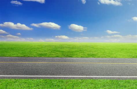 Road And Cloudy Sky And Green Grass Stock Photo Image Of Nature