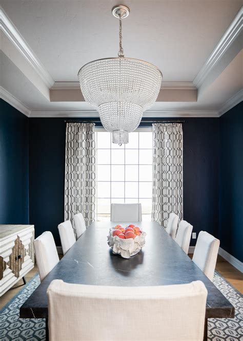 Dining Room With Tray Ceiling And Elegant Chandelier Hgtv
