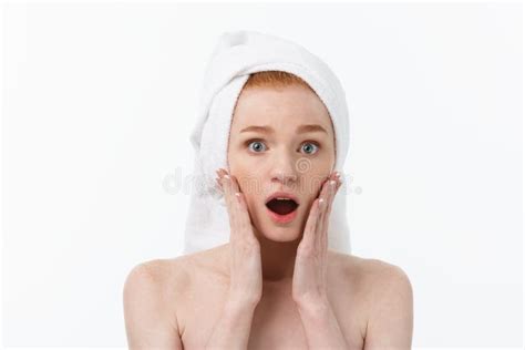 Surprised Beautiful Young Woman After Bath With A Towel On Her Head