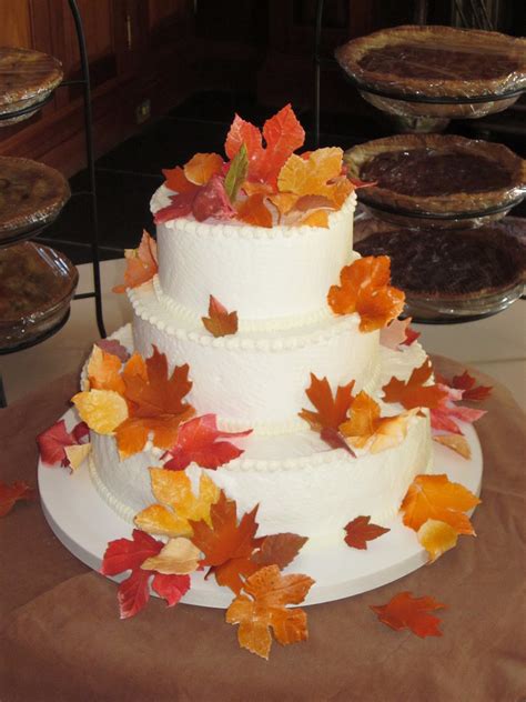 Fondant Fall Leaves Adorn This Simple Wedding Cake In Butter Cream