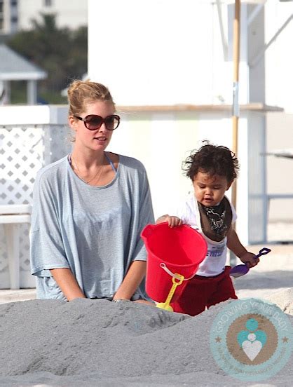 Doutzen Kroes And Son Phyllon At The Beach In Miami Growing Your Baby