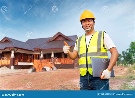 Successful Engineer Technician At House Construction Building Concept
