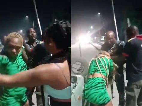 Lagos Police Officers Caught On Camera Assaulting Lady For Attempting To Record Them During A