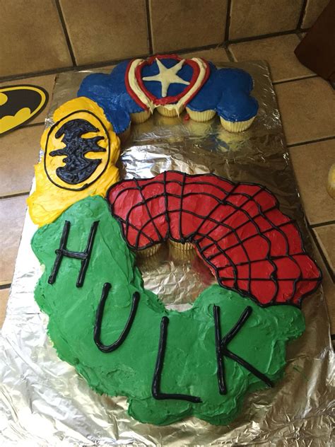 Here is page 8 of the kids birthday cakes section. Superhero cake made from cupcakes for a 6 year old's ...