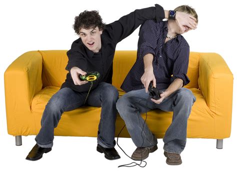 Two Men On Sofa Playing Video Game Free Photo Download Freeimages