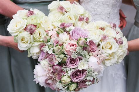 Suzanne And Mikes Wedding Bouquet Includes Amnesia Roses And