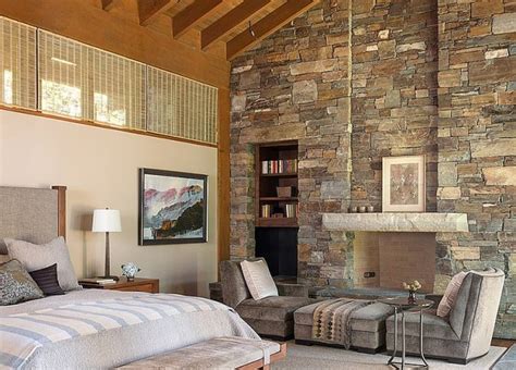 25 Bedrooms That Celebrate The Textural Brilliance Of Stone Walls