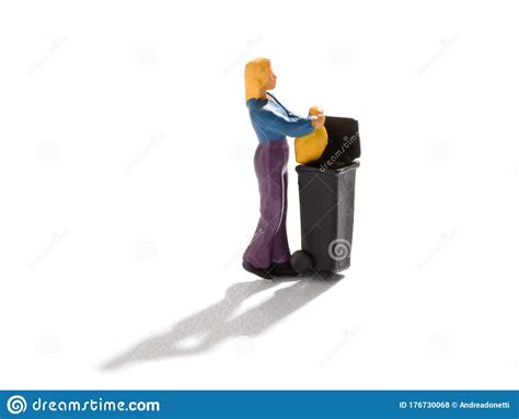 Miniature Woman Throwing Out The Household Trash Stock Photo Image Of