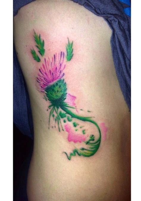 3.1 watercolor tattoo without a black base. Scottish thistle watercolor rib tattoo | Rib tattoo ...