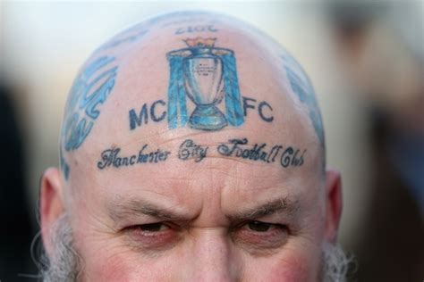 We did not find results for: One middle-aged Manchester City supporter has club tattoos all over his head Pictures | 101 ...