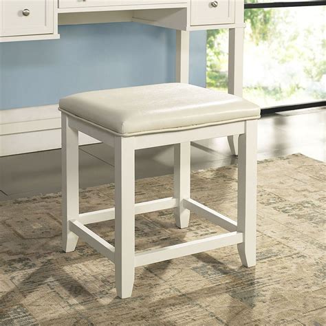 Cut the legs down to the desired length for the vanity stool if needed. Crosley Vista Faux Leather Vanity Stool in White - CF7007-WH