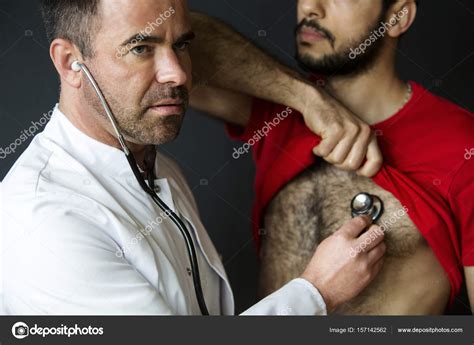Doctor With Stethoscope Listening To Patients Heartbeat — Stock Photo
