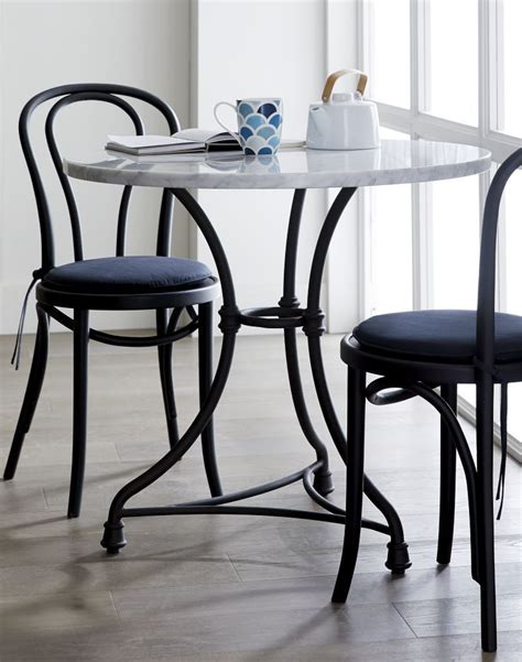 In its hutch, store tea sets, casserole dishes and serving bowls. Vienna Matte Black Dining Chair + Reviews | Crate and Barrel in 2020 (With images) | Black ...